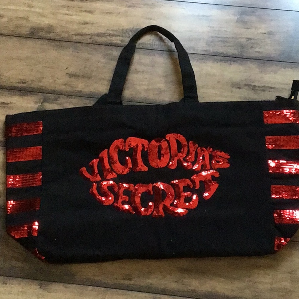 Victoria’s Secret black canvas tote bag with red sequins lips of the logo